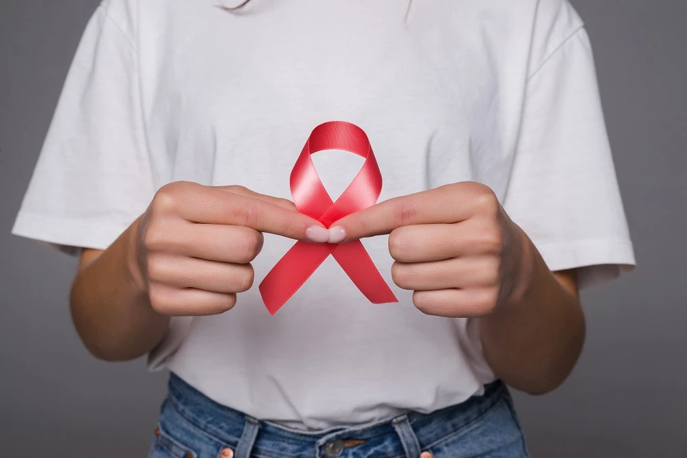 world-breast-cancer-day-concept-health-care-woman-wore-white-t-shirt-with-pink-ribbon-awareness-symbolic-bow-color-raising-people-living-with-women-s-breast-tumor-illness.jpg